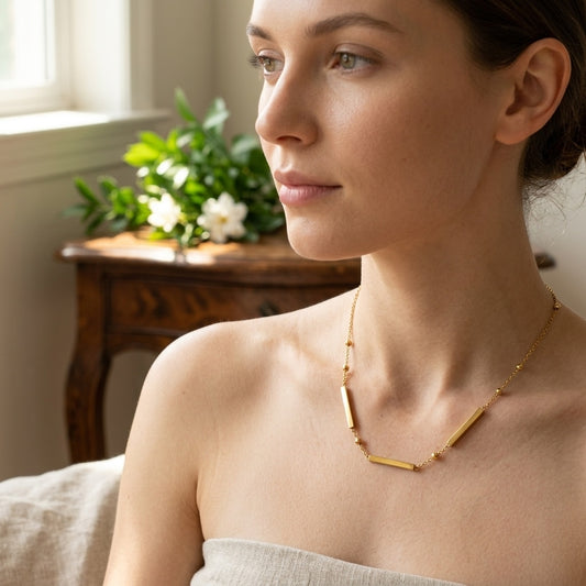 Model wearing Gold Bar Necklace